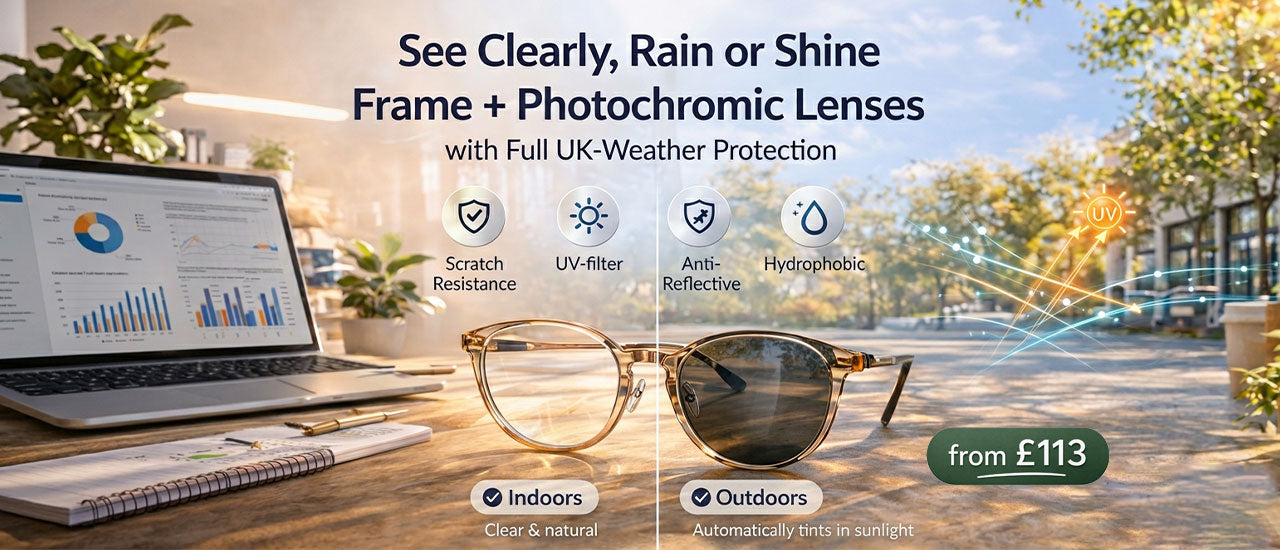 Sunglasses with photochromic lenses on a wooden table with a blurred outdoor background